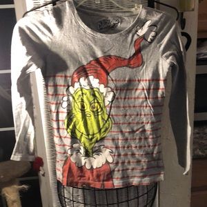 The grinch with sparkles on his hat